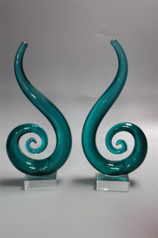 A ruby Jack in the Pulpit glass vase, height 32cm and a pair of green glass scrolls